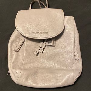 Michael Kors backpack with wallet.
